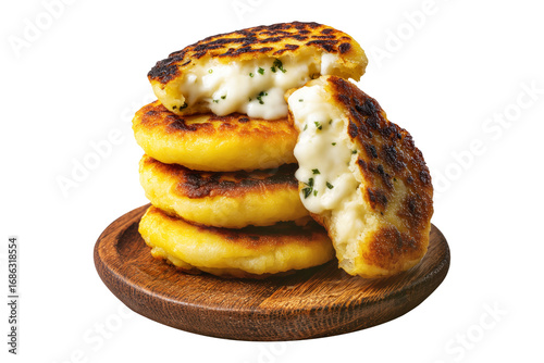 Ecuador Lapingachos fried potato patties stuffed with cheese and sprinkled herbs on wooden plate, isolated on white transparent background