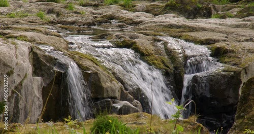 Three small waterfalls at Cenarth Falls on the river Teifi