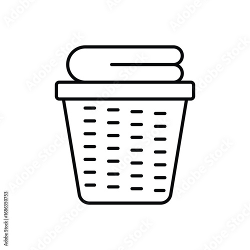 A laundry basket with folded towels The basket has vertical slits. Editable stroke. Icon vector illustration