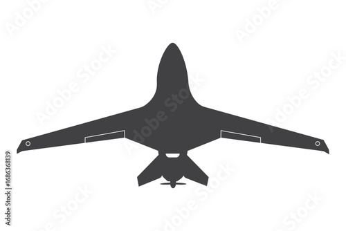 Dark silhouette of a powerful unmanned combat aerial vehicle in flight