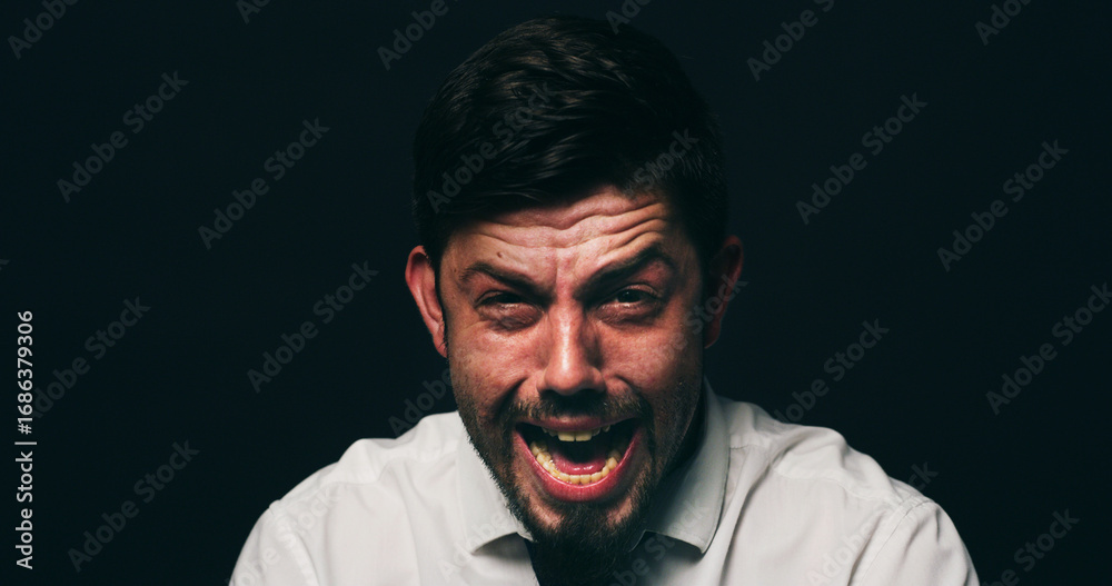 Fototapeta premium Businessman, crying and scream with depression in studio, financial crisis and space on black background. Person, shout and frustrated with mental health, anxiety and stress with anger for bankruptcy
