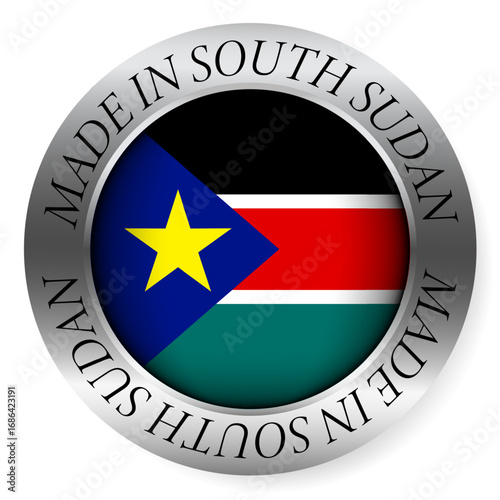 Made in South Sudan button icon. Circular emblem with metallic border, glossy central flag, and bilingual label indicating product origin and international manufacturing identity.