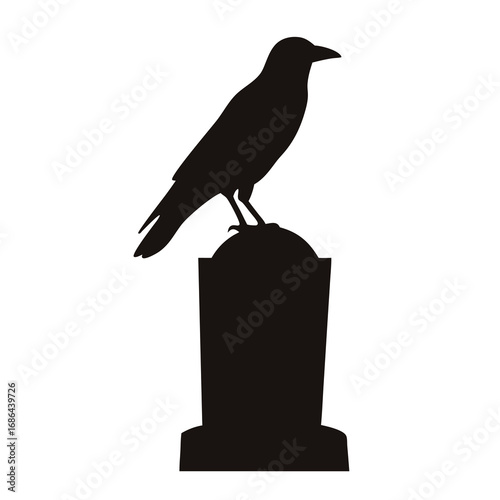 Silhouette of a crow perched on top of a weathered gravestone