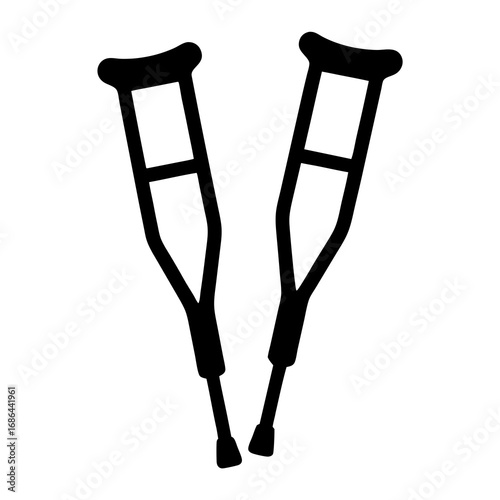 Two forearm crutches standing next to each other in a simple design
