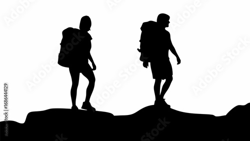 Silhouetted hikers with backpacks walking on a mountain ridge against a stark white background landscape view