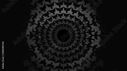 Circular arrangement of bat silhouettes radiating from a central dark void in grayscale format