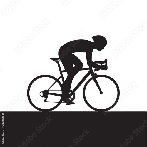 Silhouette of a cyclist in a racing position on a road bike
