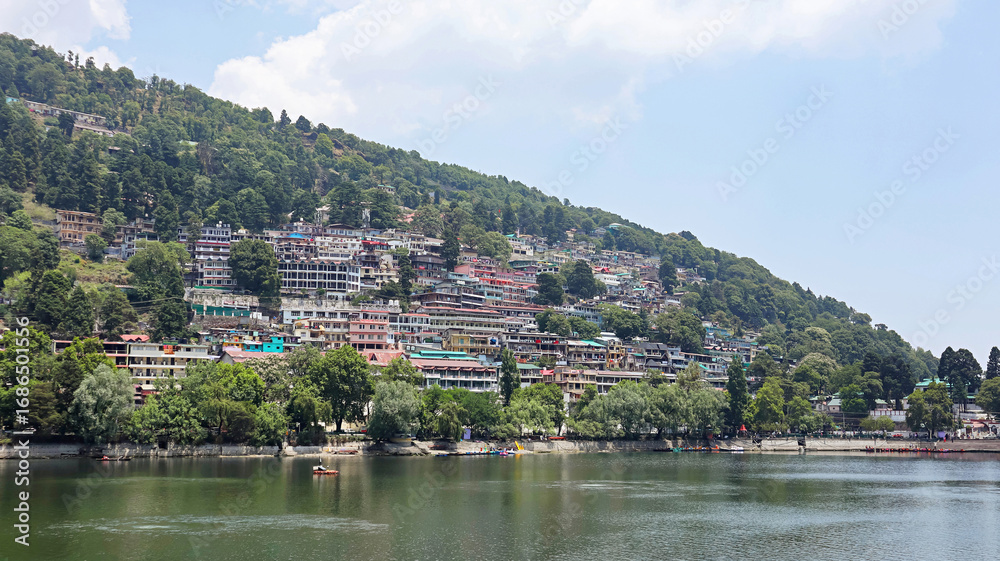 Fototapeta premium Captivating cityscape encircling the Naini Lake in Nainital, Uttarakhand, India.