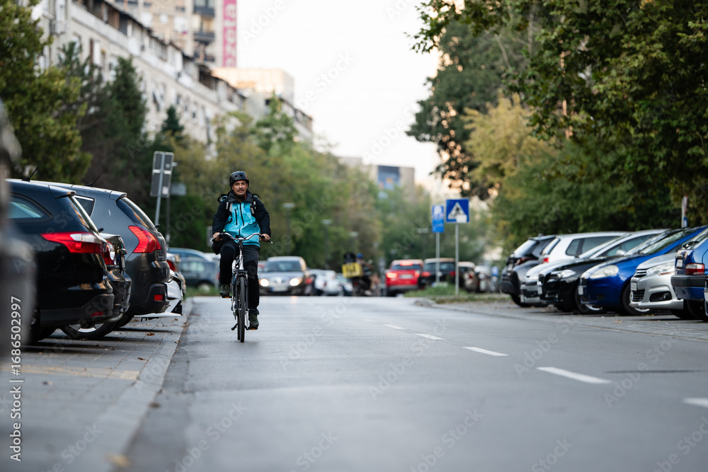 custom made wallpaper toronto digitalDelivery man riding bicycle on city street delivering food