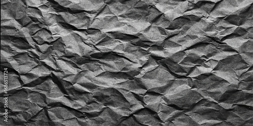 A vintage, textured blank sheet of paper with a crumpled, black and white stone pattern