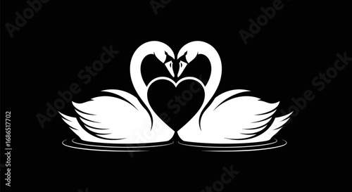 Two elegant white swans creating a heart shape with their necks.