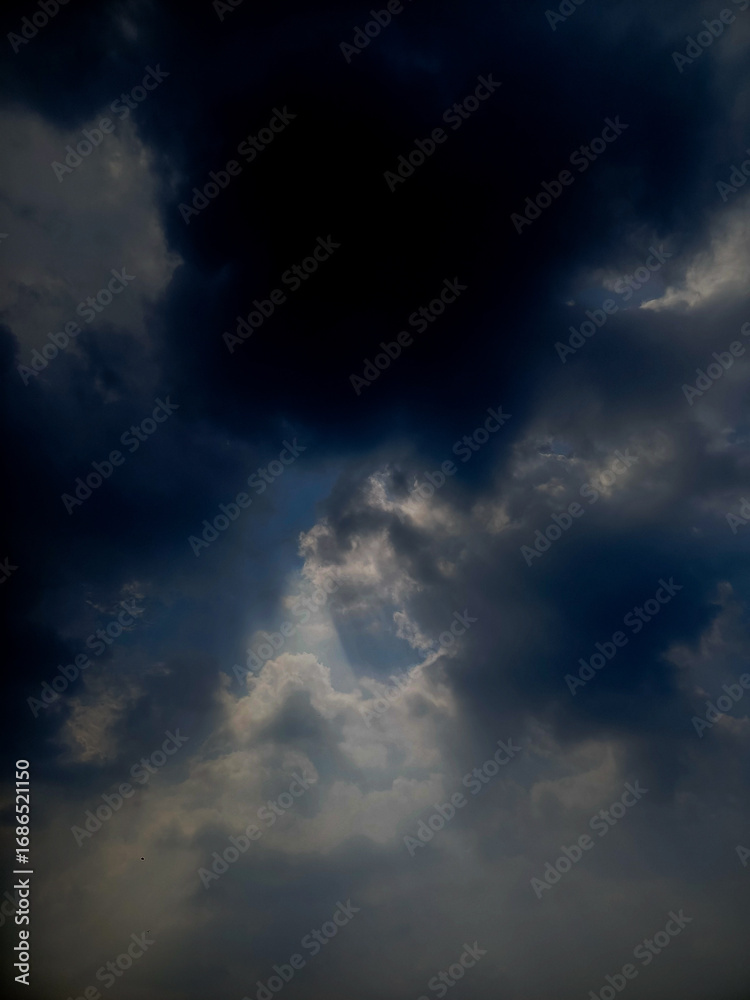 Obraz premium Dark stormy clouds on sky. 