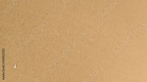 Background of brown kraft paper or cardboard texture. close up of cardboard texture background.