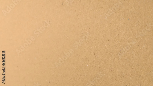Background of brown kraft paper or cardboard texture. Brown recycled paper texture background.