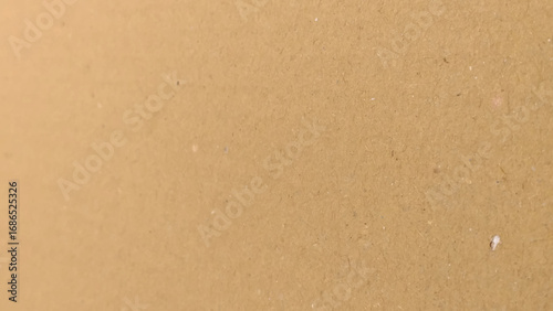 Background of brown kraft paper or cardboard texture. Brown recycled paper texture background.