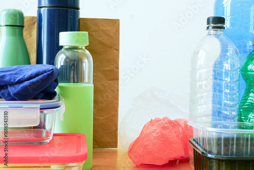 Everyday objects divided into disposable plastics and durable eco packaging. Presentation underlines choosing sustainability. Concept of mindful consumption, healthy habits and conscious living