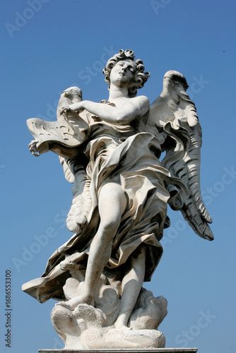 Saint Angelo bridge statue : Angel .  Rome. Italy.