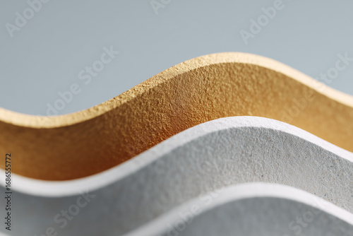 Abstract dimensional background with sculptural relief shapes, elegant geometric textures creating modern minimalist design with depth, light, and shadow for sophisticated decorative layout