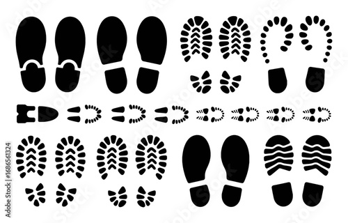 Collection of Black Footprint and Shoe Sole Imprints on White Background