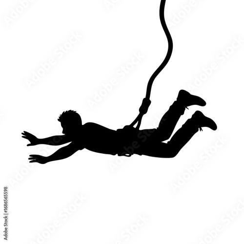 Silhouette of man bungee jumping in mid-air against white background  