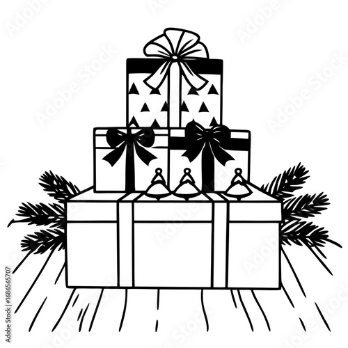 Colorful gift boxes arranged with pine branches on wooden floor  