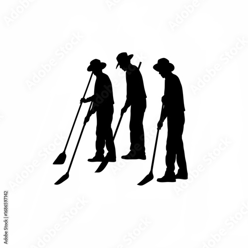 Silhouette of a historical worker cleaning agricultural tools after a day s labor