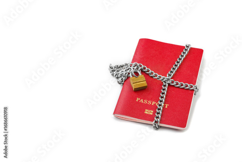 Passports with a lock and key on top.