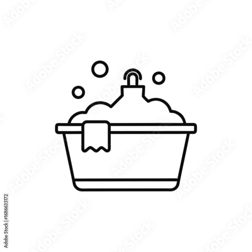 A black outline of a washbasin filled with suds A small towel hangs on the side Above the washbasin there is a faucet Bubbles float around the washbasin. Editable stroke. Icon vector illustration