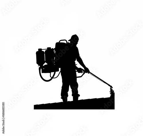 Silhouette of agricultural worker refilling crop duster with pesticide