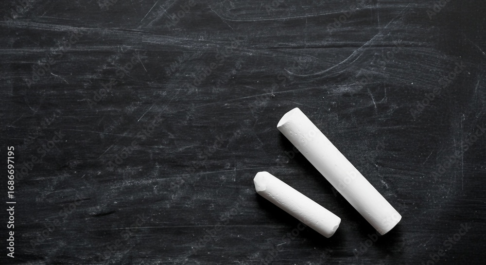 Naklejka premium Chalk on Blackboard Background | Texture for School Education, Art, and Design Projects