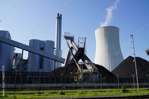 Coal fired power plant with stone coal dump in Hanover Stoecken, Lower Saxony, Germany. An old technology that is partly responsible for global warming.