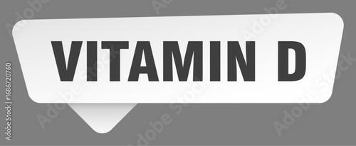 vitamin d sign. vitamin d white sticker isolated on gray background