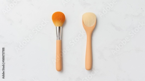 Stylish Makeup Brushes on Marble Background with Soft Shadows Evoking Elegance