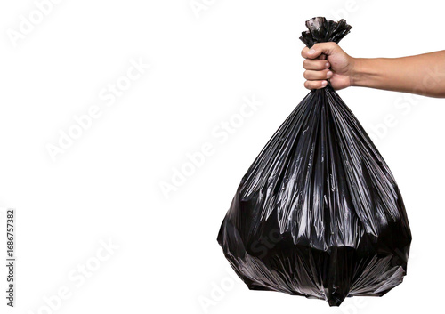 Hand holds out a rubbish bag isolated on transparent or white background