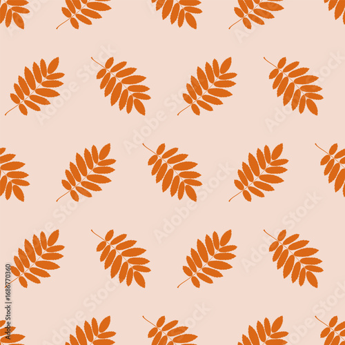 Seamless pattern with orange rowan tree leaves on a light pink background. Vector editable background.	