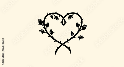 Heart shape made of intertwined thorny branches.
