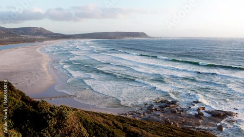 Scenic ocean bay with sandy beach view. Noordhoek beach.