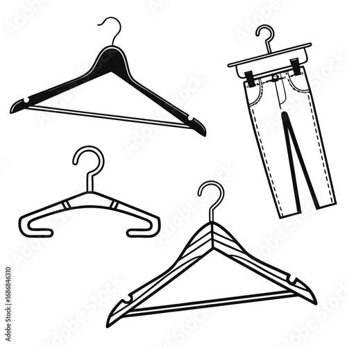 Black and white clothing hangers and pants garment accessory