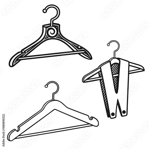 Black and white clothing hangers with decorative elements garment accessory