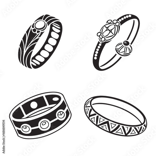 Four black and white decorative bracelets and bangles jewelry accessory
