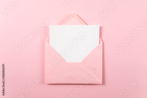 pink envelope on pink background