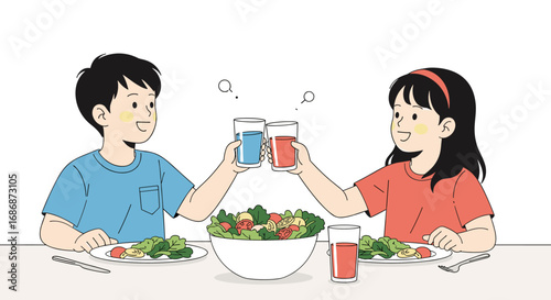 Two happy children toasting with colorful drinks over a large bowl of salad at a table for a healthy meal