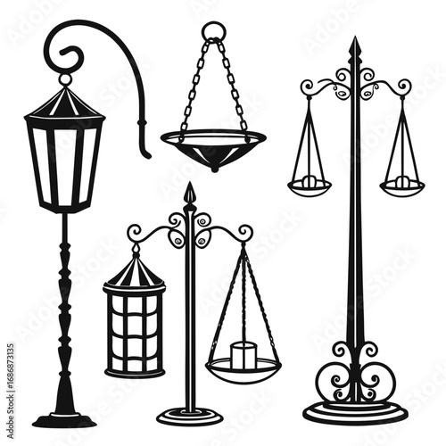 Ornate lamps and scales with candle black white