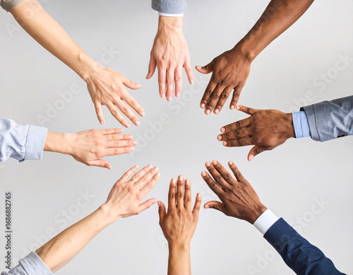 Collaborative hands meeting professional environment photography multi-ethnic top-down view teamwork concept