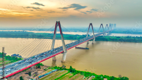 Photography Aerial skyline view of Nhat Tan bridge in Hanoi city, Vietnam.