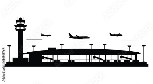 airport terminal with control tower planes and lampposts silhouette