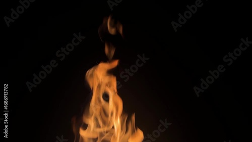 Strong fire on black background. Yellow flames on black background. Beautiful flame on black background