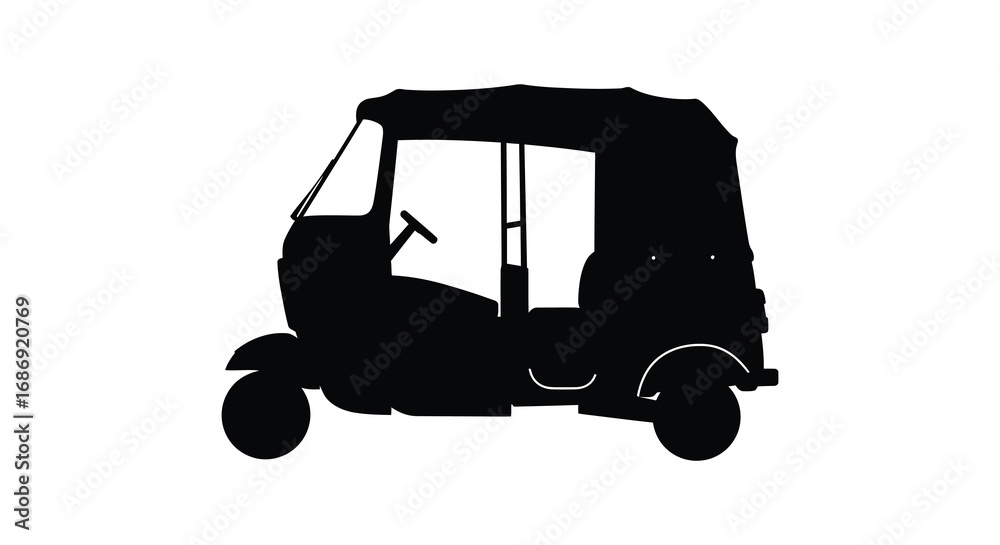 Fototapeta premium a silhouette of a small vehicle with three wheels
