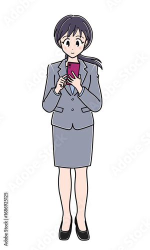 スマートフォンを操作するスーツのOLさん（全身）