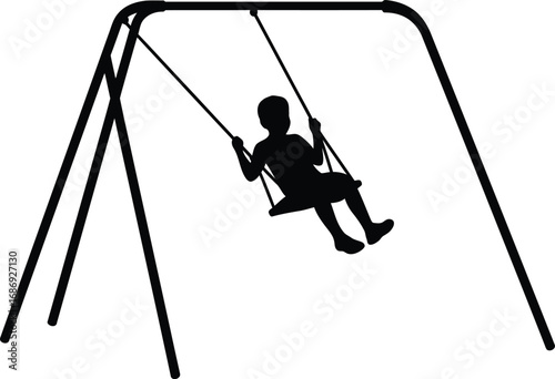 a child swinging joyfully on a metal swing set